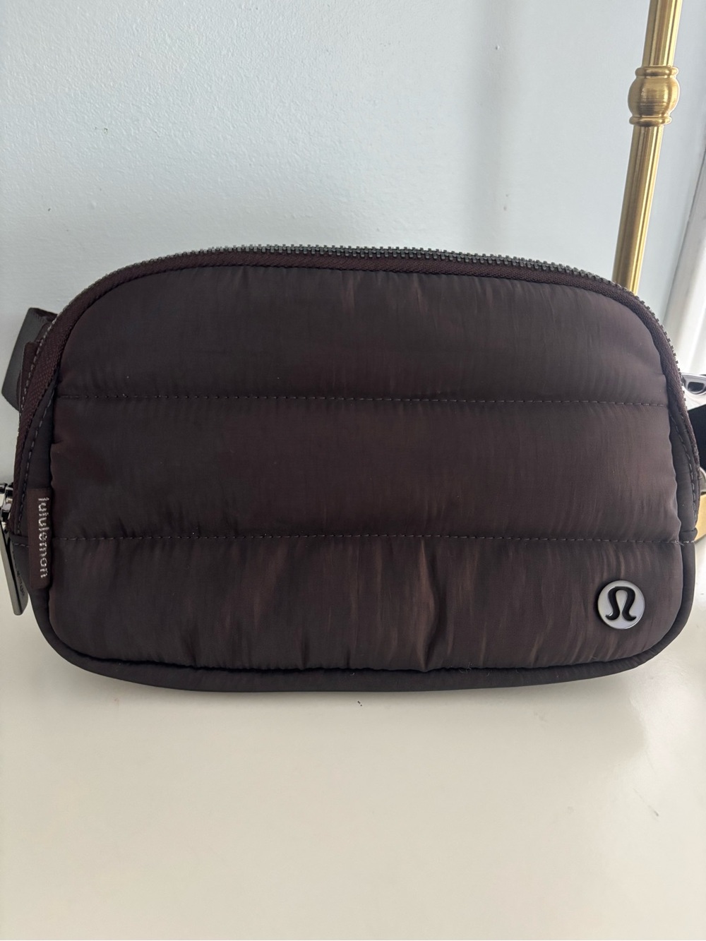 lululemon athletica Quilted Puffer Sling Bag in Dark Brown iridescent